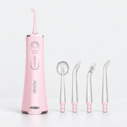 LP211 Pink cordless water flosser with four matching replacement tips