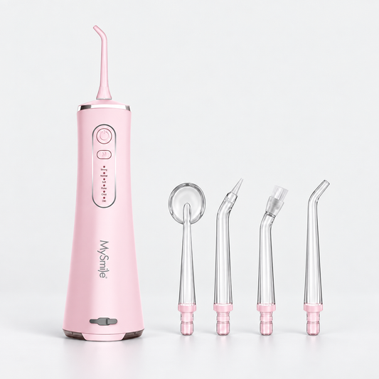 LP211 Pink cordless water flosser with four matching replacement tips